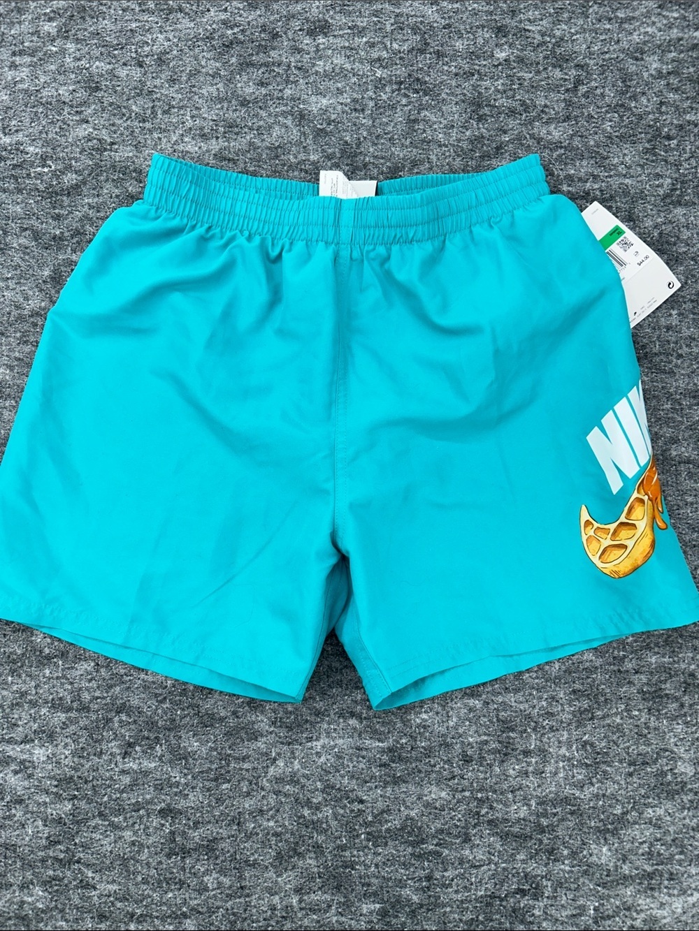 Nike Kids Turquoise Swim Shorts with White Logo and Gold Swoosh Size XL
